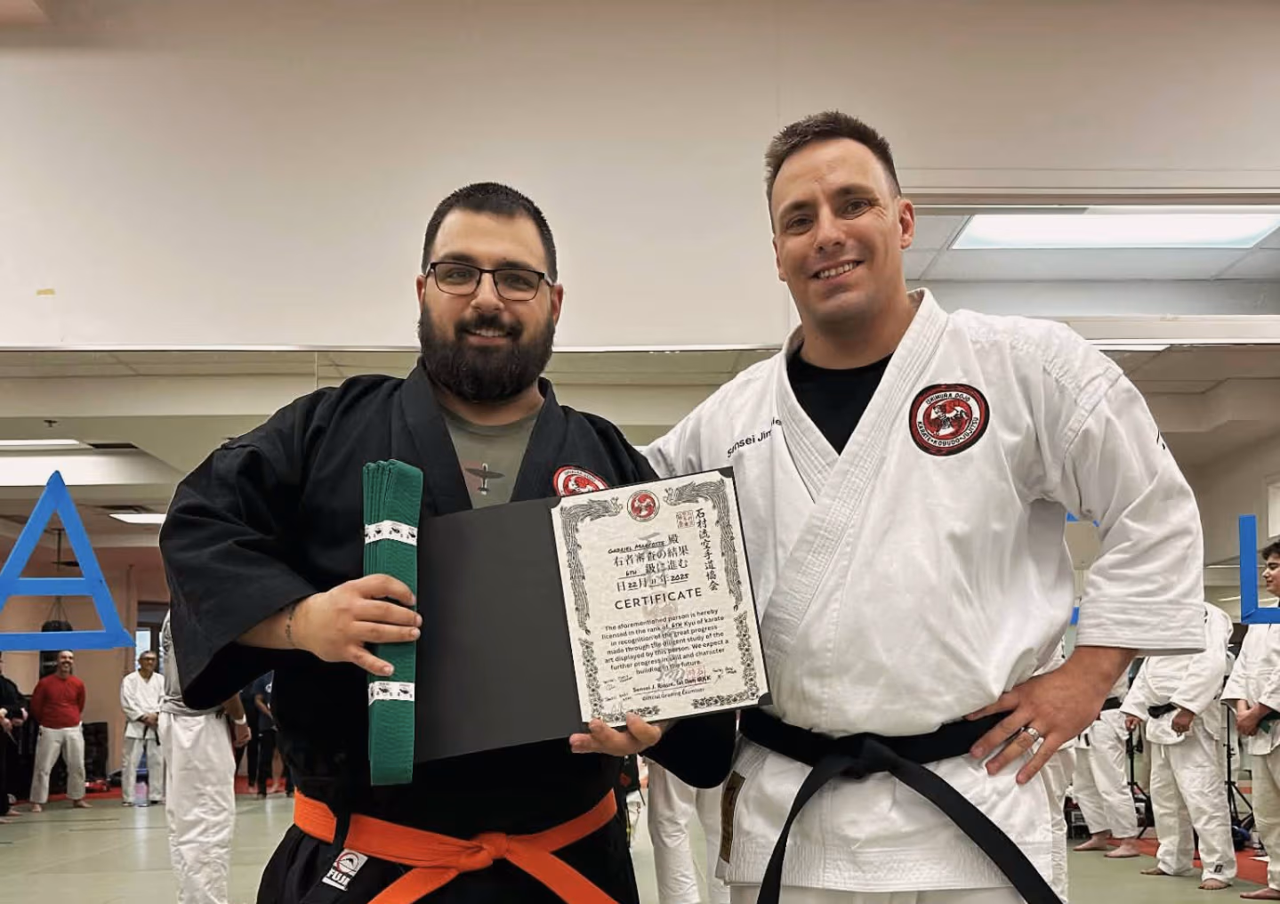 Remise de certification à un élève du Ishimura Dojo
